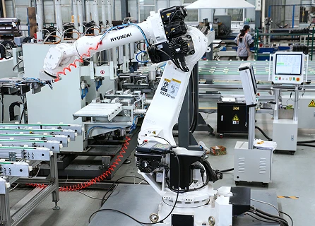 Industrial robotic arm on the Delburg production line