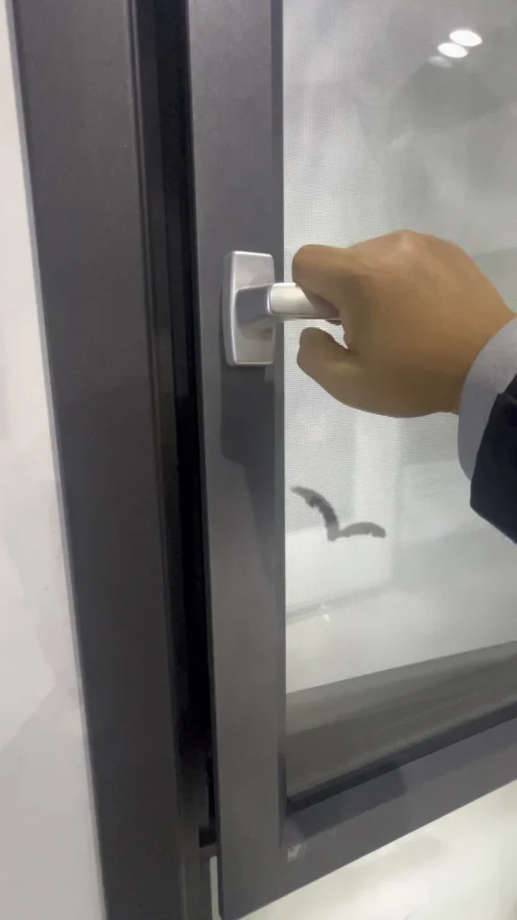 Handle operation on a 92 Series aluminum casement window showroom sample